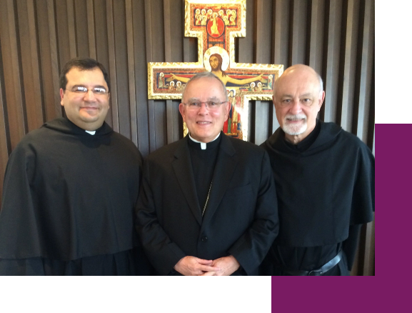 Three bishops at the United States Conference of Catholic Bishops in 2015.
