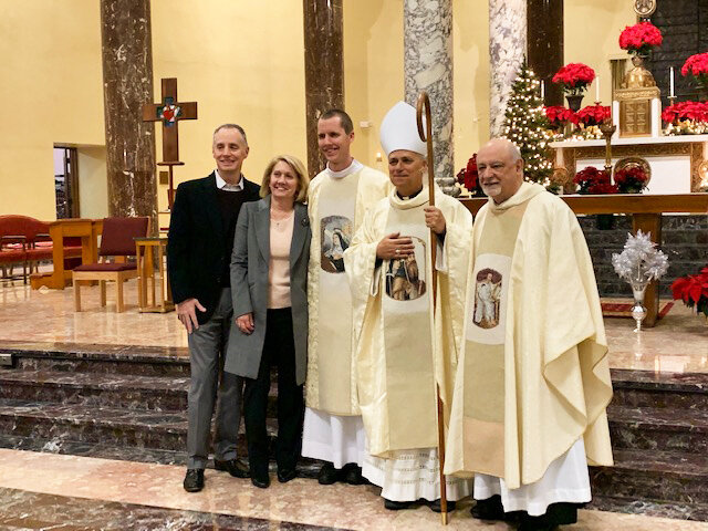 (l-r) Affiliates of the Order, Martin and Jacqueline Madden with son, Br. Dan Madden, O.S.A., Bishop Robert Prevost O.S.A. and Fr. Michael Di Gregorio, O.S.A., Prior Provincial.